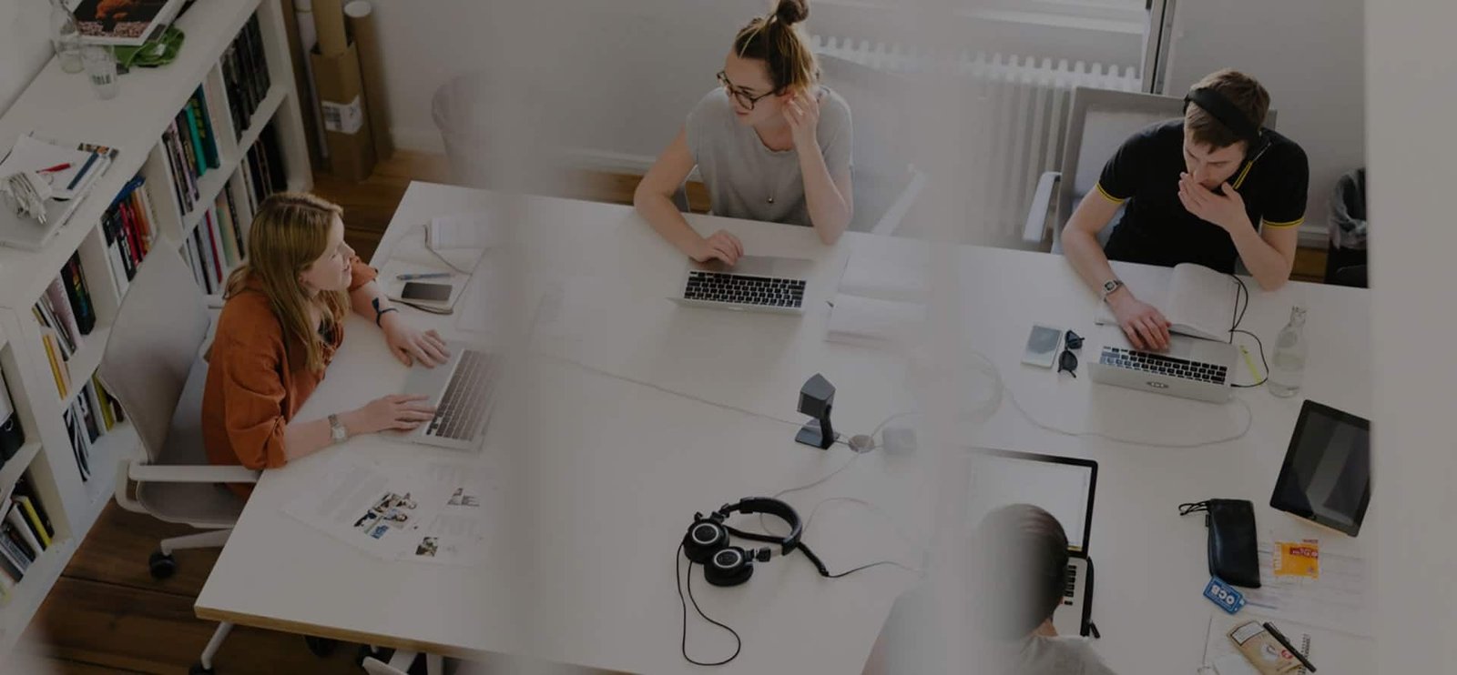 Developer team working on a booking system for a travel company
